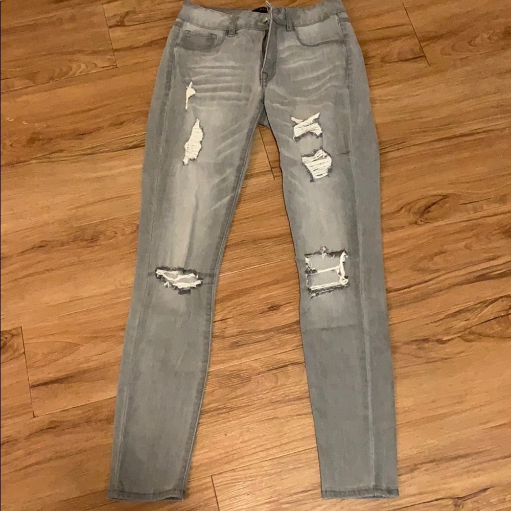 Distressed gray jeans
